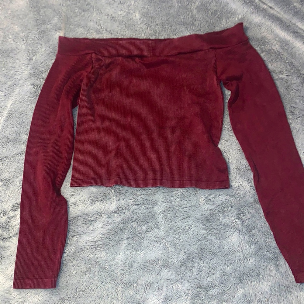 Off the shoulder maroon top.
